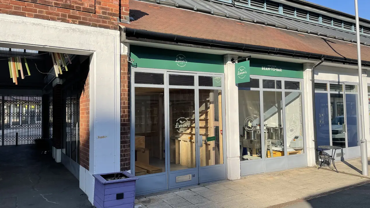 Shop front with new fascia signage and canopy
